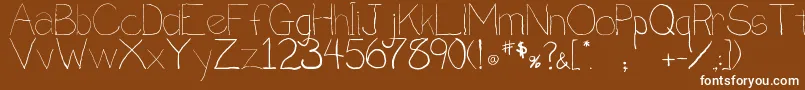 Fonte Penmanship.B – fontes brancas em um fundo marrom