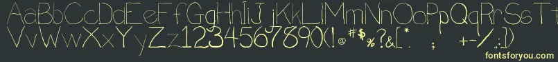 Penmanship.B Font – Yellow Fonts on Black Background