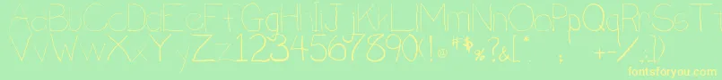 フォントPenmanship.B – 黄色の文字が緑の背景にあります