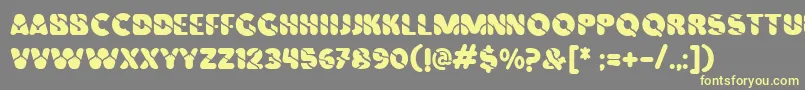 Vinilo Font – Yellow Fonts on Gray Background