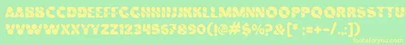 Vinilo Font – Yellow Fonts on Green Background