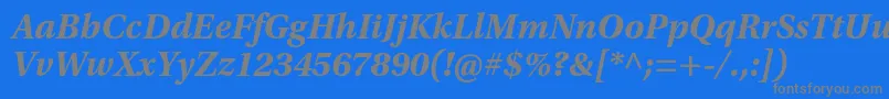 UtopiastdBoldit-fontti – harmaat kirjasimet sinisellä taustalla