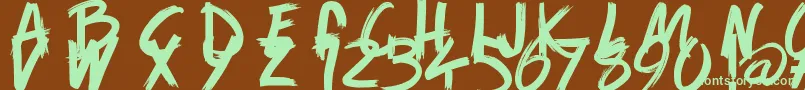GameOfBrush-fontti – vihreät fontit ruskealla taustalla