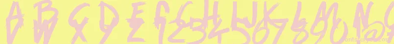 フォントGameOfBrush – ピンクのフォント、黄色の背景