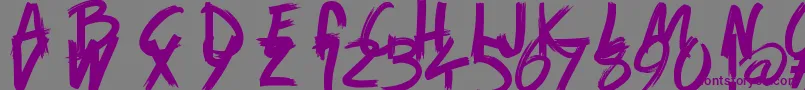 Czcionka GameOfBrush – fioletowe czcionki na szarym tle