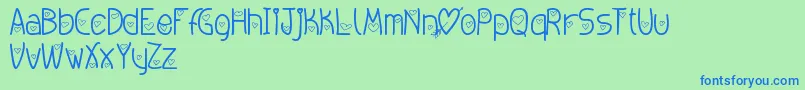 フォントAmoremio – 青い文字は緑の背景です。