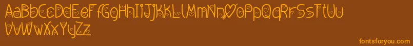 Amoremio Font – Orange Fonts on Brown Background