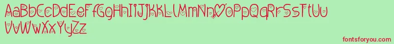 Amoremio Font – Red Fonts on Green Background