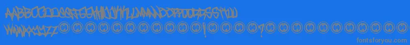 TurntupBold-fontti – harmaat kirjasimet sinisellä taustalla
