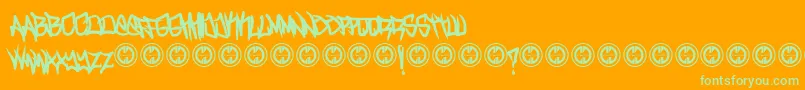 TurntupBold-Schriftart – Grüne Schriften auf orangefarbenem Hintergrund