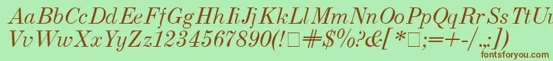 Fonte Usualnew Italic – fontes marrons em um fundo verde