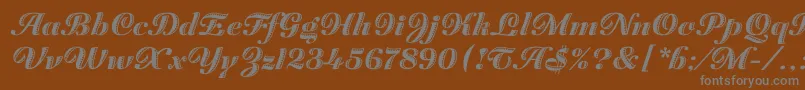 Шрифт ZaragozaLetPlain.1.0 – серые шрифты на коричневом фоне