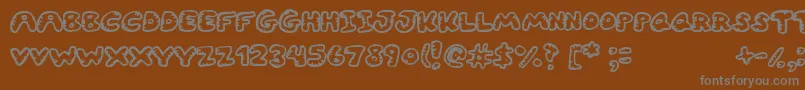 Gwibble Font – Gray Fonts on Brown Background