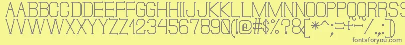 DonMoiseSt-fontti – harmaat kirjasimet keltaisella taustalla