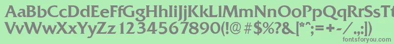 フォントQuadratserialMediumRegular – 緑の背景に灰色の文字