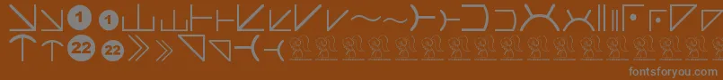Więcej informacji o czcionce FuturamaAlienAlphabetTwo Czcionka FuturamaAlienAlphabetTwo – szare czcionki na brązowym tle