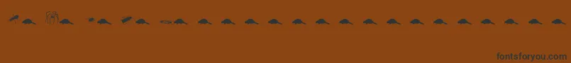 Czcionka Animals2 – czarne czcionki na brązowym tle