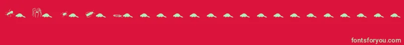 Saiba mais sobre a fonte Animals2 Fonte Animals2 – fontes verdes em um fundo vermelho