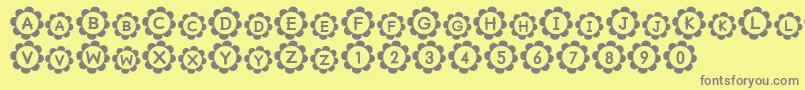 フォントPuRiNSrb – 黄色の背景に灰色の文字
