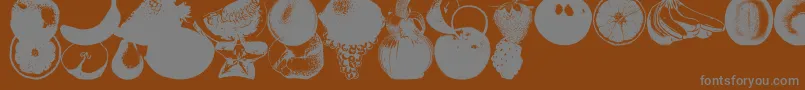 Czcionka AnAppleADayFruitFont – szare czcionki na brązowym tle