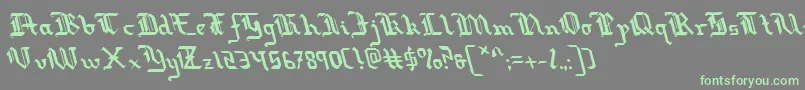 フォントRedcoatleft – 灰色の背景に緑のフォント