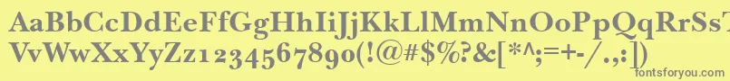 フォントNewbaskervilleodttBold – 黄色の背景に灰色の文字