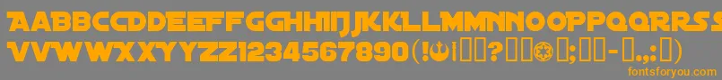 フォントDistantGalaxy – オレンジの文字は灰色の背景にあります。