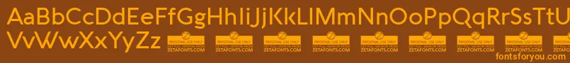 Fonte AquawaxMediumTrial – fontes laranjas em um fundo marrom