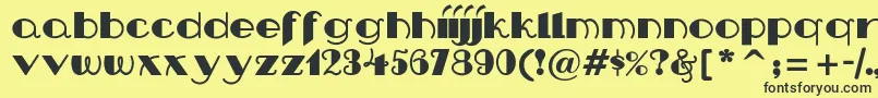 Nipandtuck Font – Black Fonts on Yellow Background