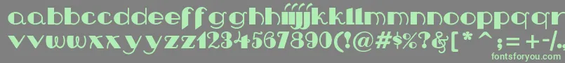 Nipandtuck Font – Green Fonts on Gray Background