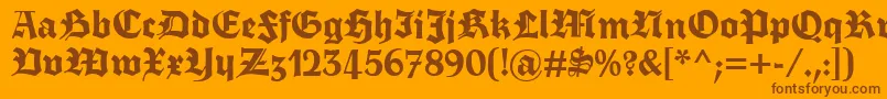Fettetrumpdeutsch-Schriftart – Braune Schriften auf orangefarbenem Hintergrund