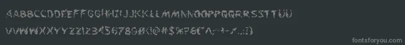 フォントFlesheatingwhack – 黒い背景に灰色の文字