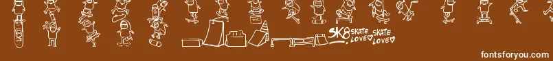 Skatelove-fontti – valkoiset fontit ruskealla taustalla