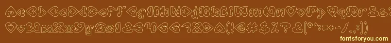EternalLoveHollow-fontti – keltaiset fontit ruskealla taustalla