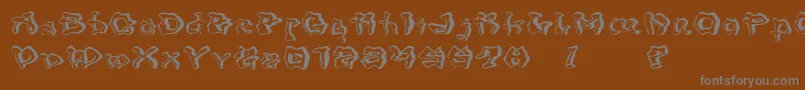 フォントMondrongoTrash – 茶色の背景に灰色の文字