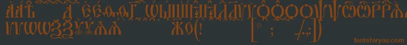 IrmologionCapsKucs Font – Brown Fonts on Black Background