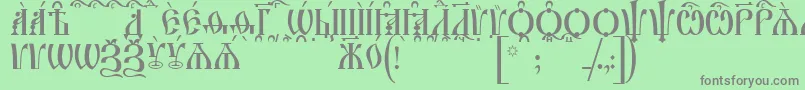 IrmologionCapsKucs Font – Gray Fonts on Green Background