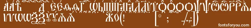 IrmologionCapsKucs-Schriftart – Weiße Schriften auf braunem Hintergrund