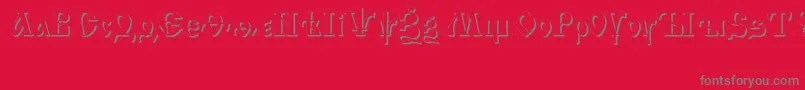 IzhitsashadowcttRegular-fontti – harmaat kirjasimet punaisella taustalla