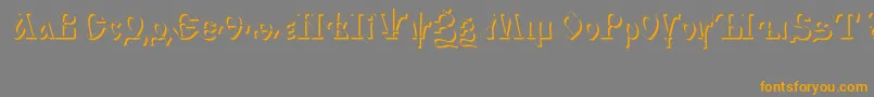 フォントIzhitsashadowcttRegular – オレンジの文字は灰色の背景にあります。