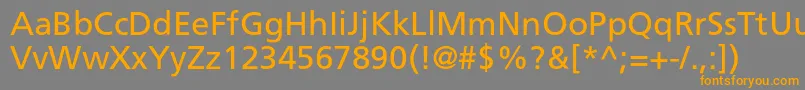 フォントAgforeignerc – オレンジの文字は灰色の背景にあります。