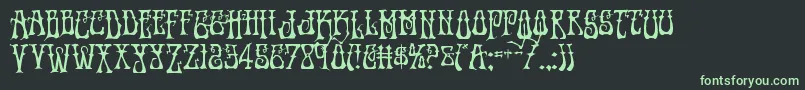 フォントInstantzendrop – 黒い背景に緑の文字