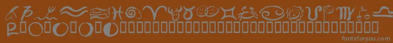 Pinxitastroll-Schriftart – Graue Schriften auf braunem Hintergrund