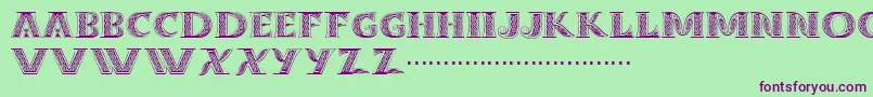 フォントDropcaps – 緑の背景に紫のフォント