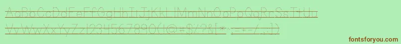 フォントKgprimarydotslinedalt – 緑の背景に茶色のフォント