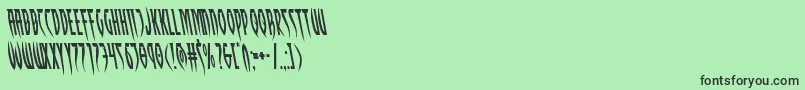 Czcionka Inhumanityleft – czarne czcionki na zielonym tle