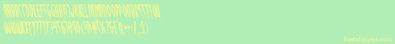 Czcionka Inhumanityleft – żółte czcionki na zielonym tle