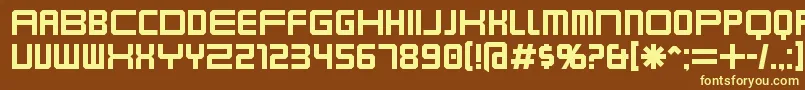 Karnivore-fontti – keltaiset fontit ruskealla taustalla