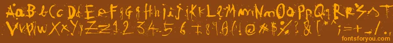 WoodcutterTintaChina Font – Orange Fonts on Brown Background