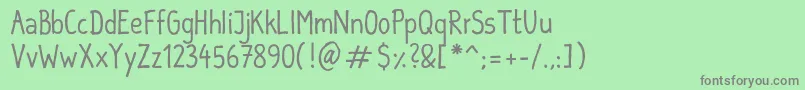 SebastianInformal Font – Gray Fonts on Green Background
